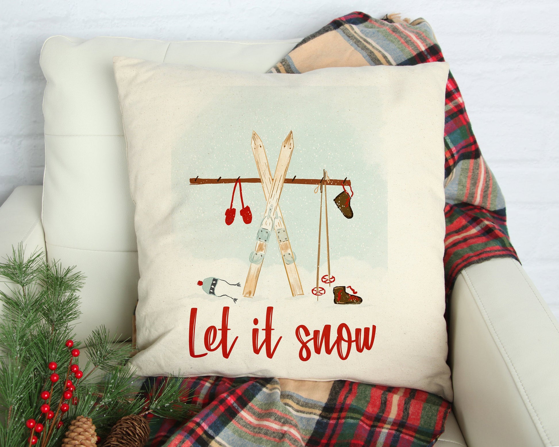 Let It Snow with Skis 18x18 inch Pillow Cover featuring a cozy winter design on a natural linen background.