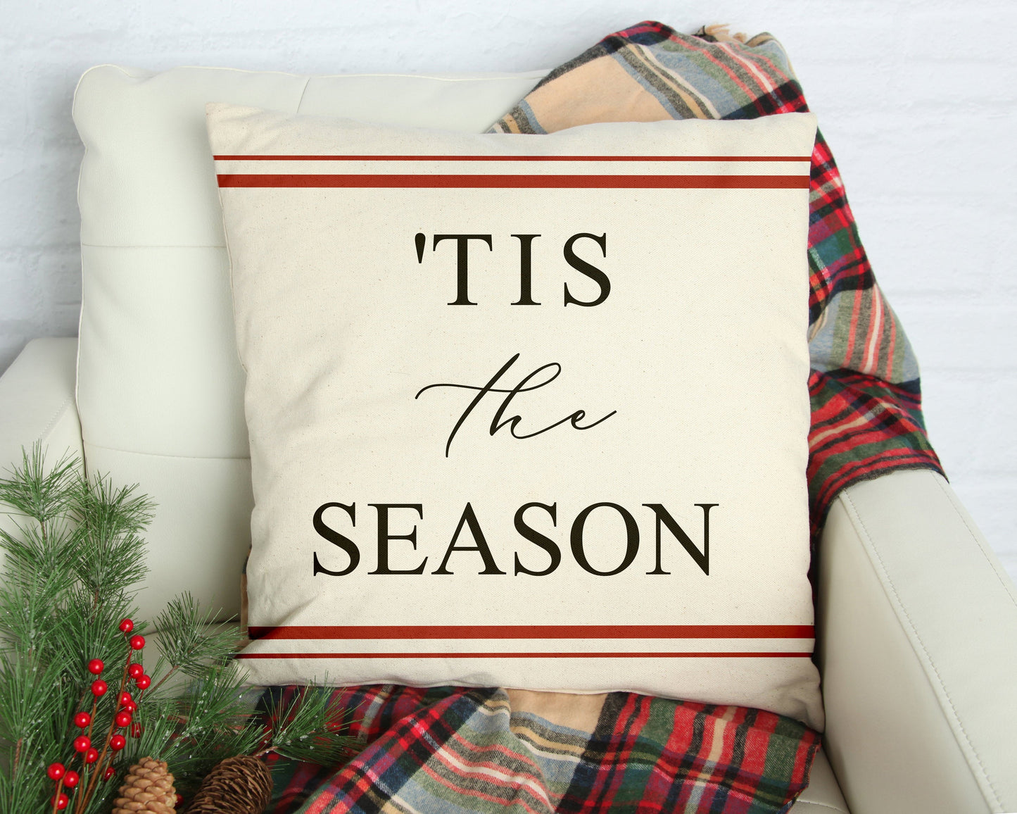 Tis the Season Red Farmhouse Stripes 18x18 inch Pillow Cover displayed on a cozy chair with holiday decor.