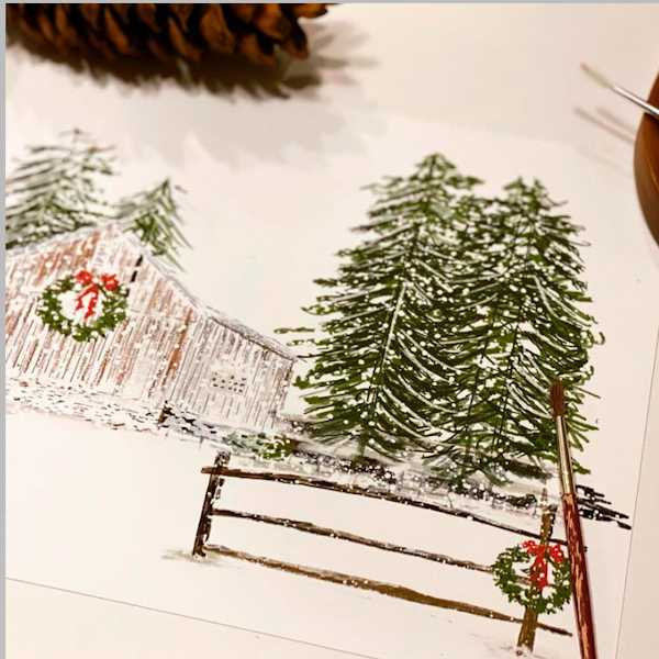 Merry Christmas with Man Carrying Tree 12x20 inch Pillow Cover artwork showing snowy landscape with cabin and evergreens.