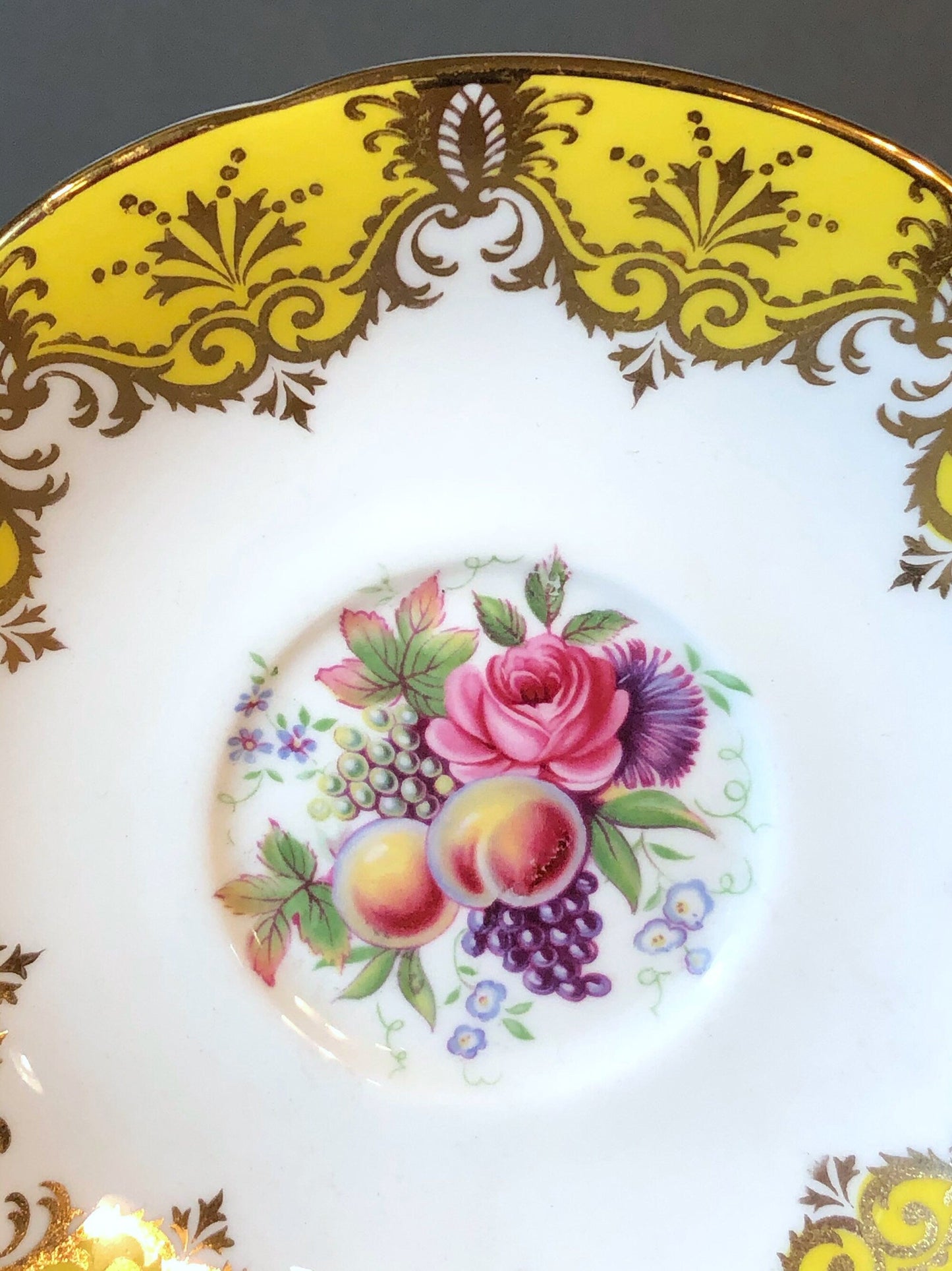 Tea Cup and Saucer by Paragon Made in England in Yellow, Gold, Pink.