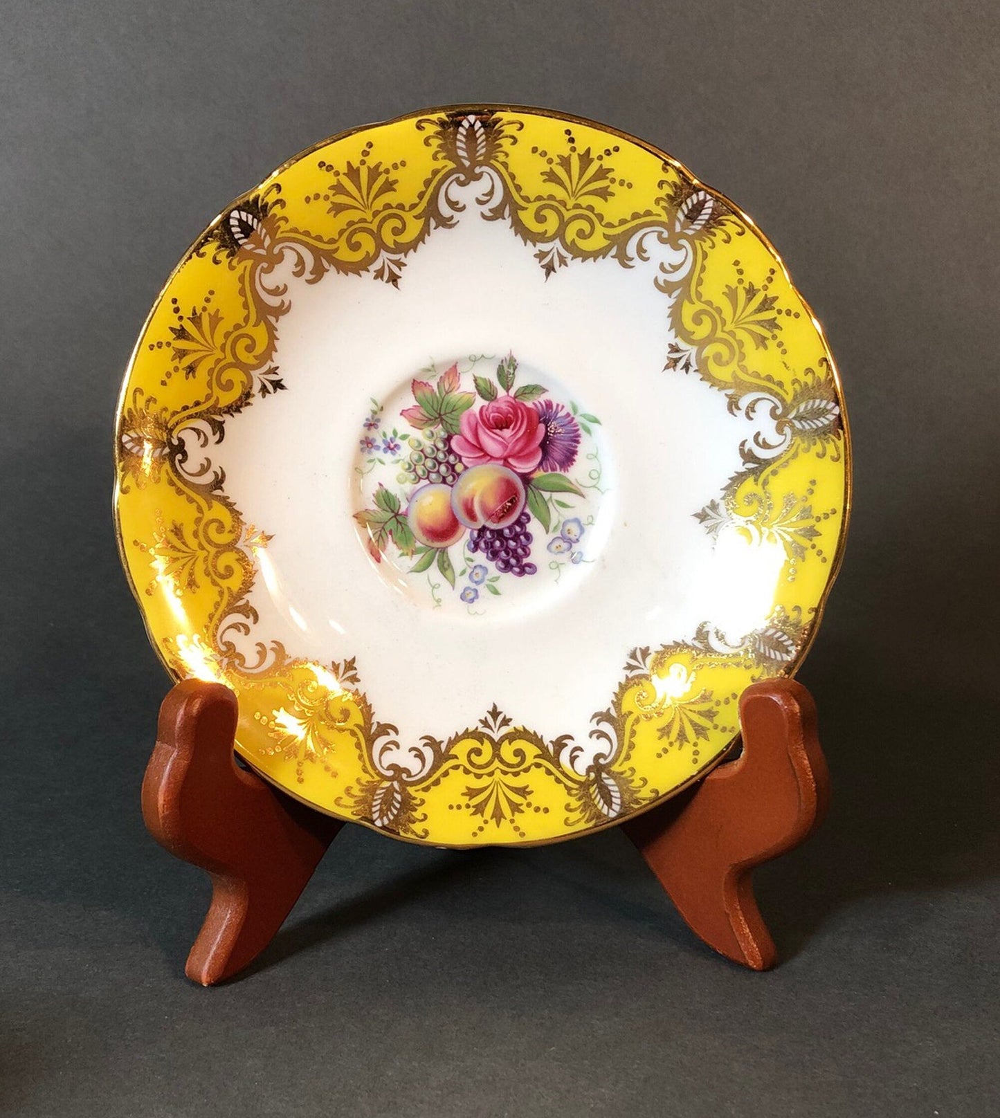 Tea Cup and Saucer by Paragon Made in England in Yellow, Gold, Pink.