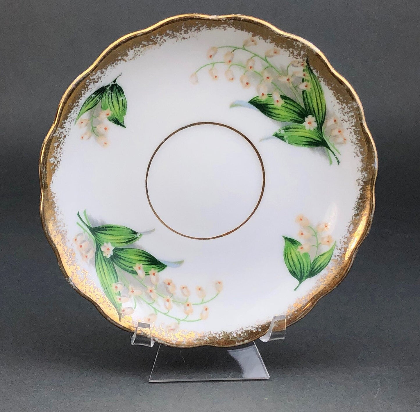 Vintage Teacup and Saucer with Lilies of the Valley Pattern.