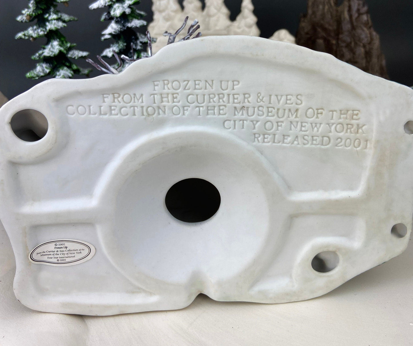 Illuminated Christmas Village House/Water Mill.  "Frozen Up" by Currier and Ives.  Collection of the Museum of the City of NY.