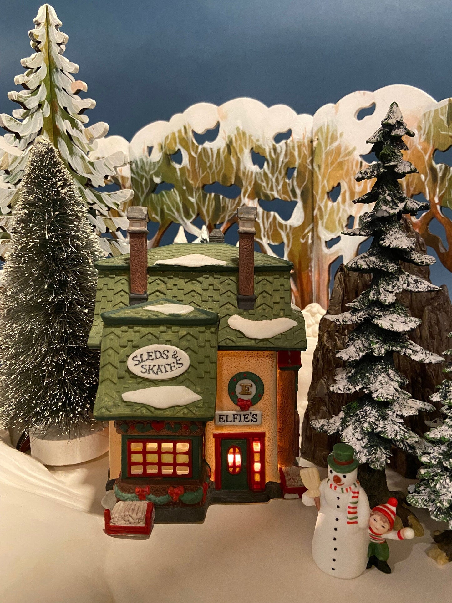 Department 56 Illuminated House. Elfie's Sleds and Skates. North Pole Series. Hand Painted Porcelain Building with Lights. Christmas Decor.