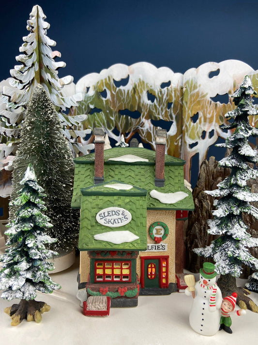Department 56 Illuminated House. Elfie's Sleds and Skates. North Pole Series. Hand Painted Porcelain Building with Lights. Christmas Decor.
