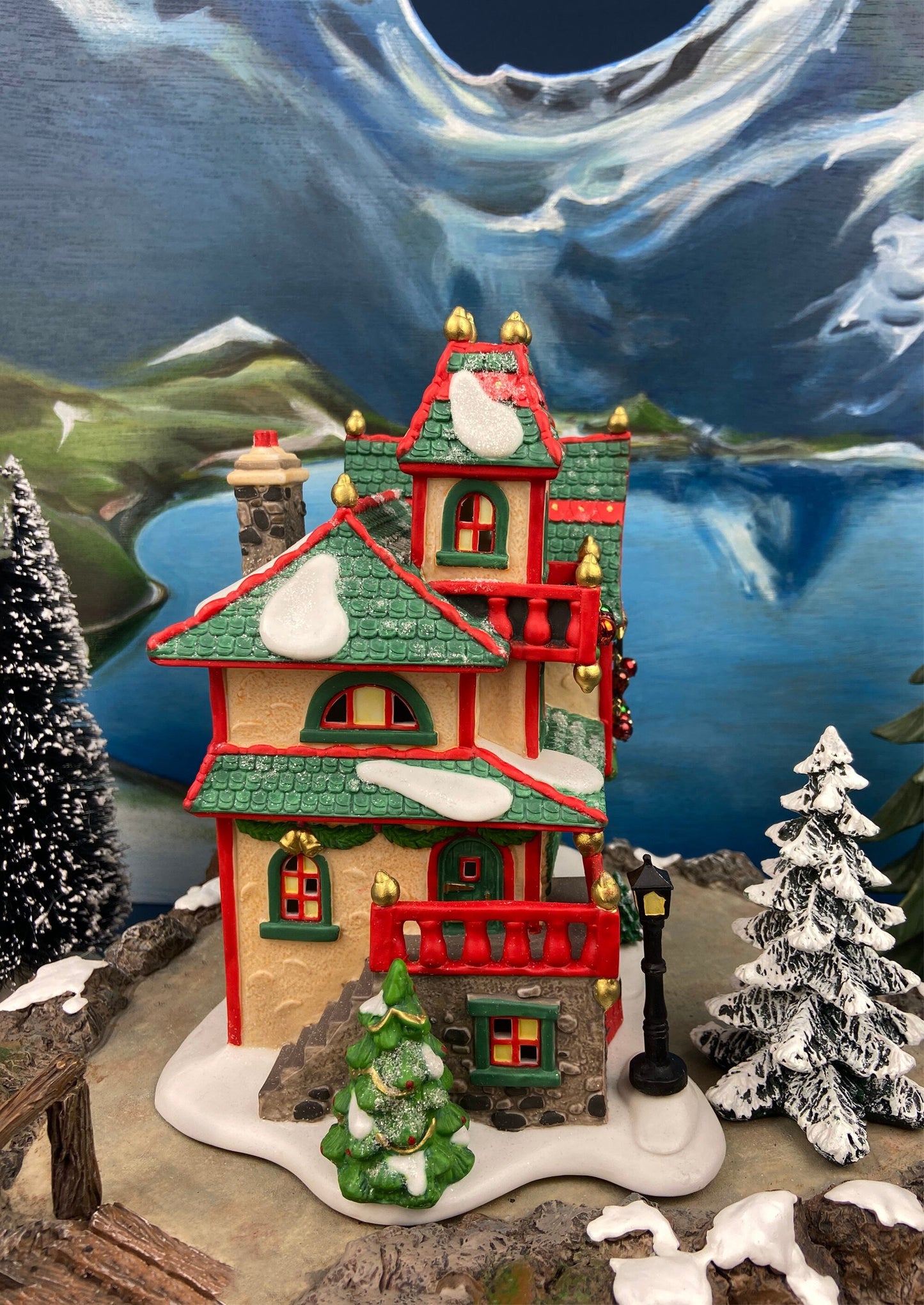 Illuminated Christmas Village House. Glass Ornament Works by Department 56. North Pole Series. Holiday Decor. Christmas Celebration.