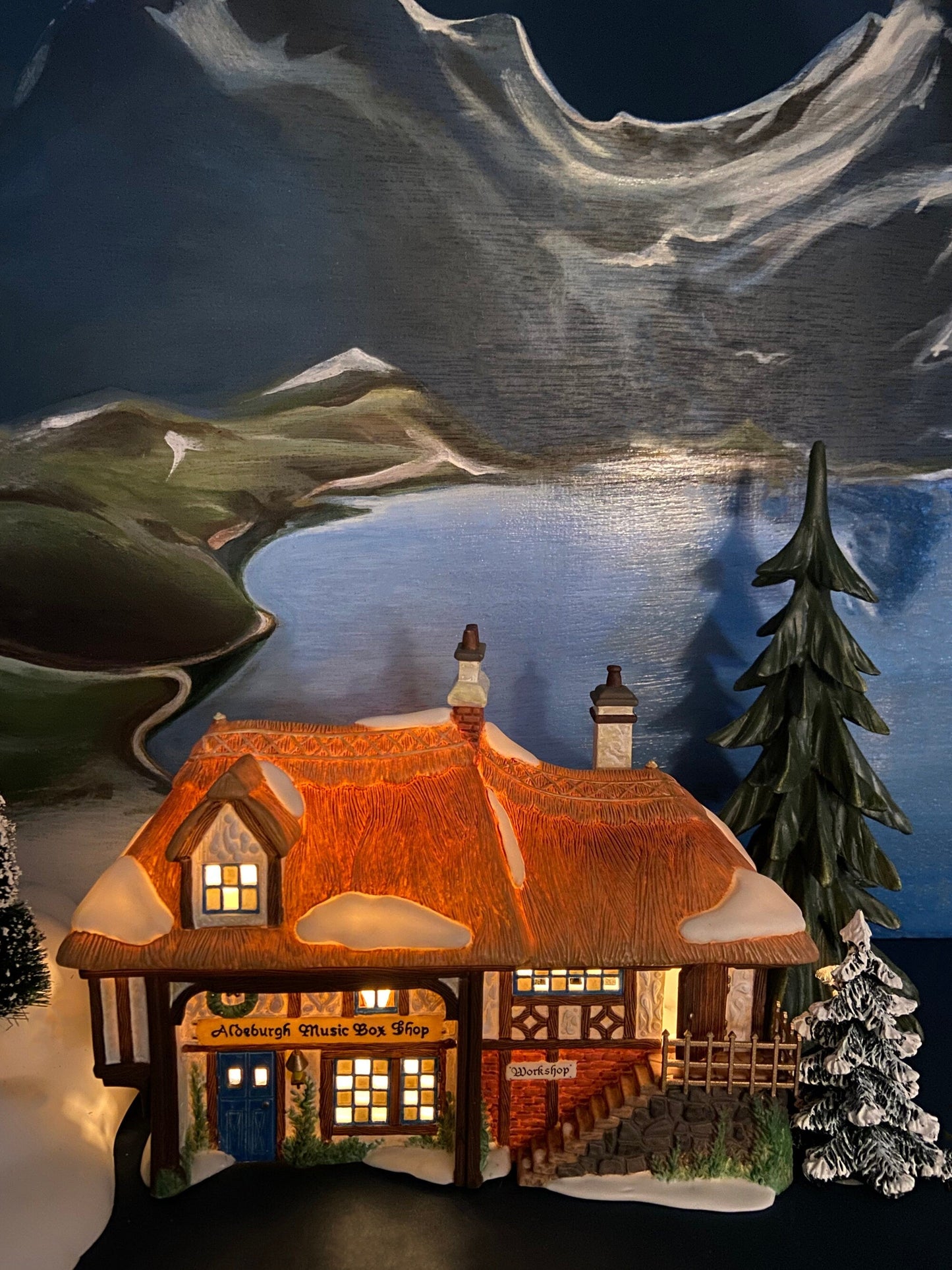 Illuminated Aldeburgh Music Box Shop. Celebrating Music. Christmas Village Porcelain House and Built-in Music Box. Dickens' Village Series.