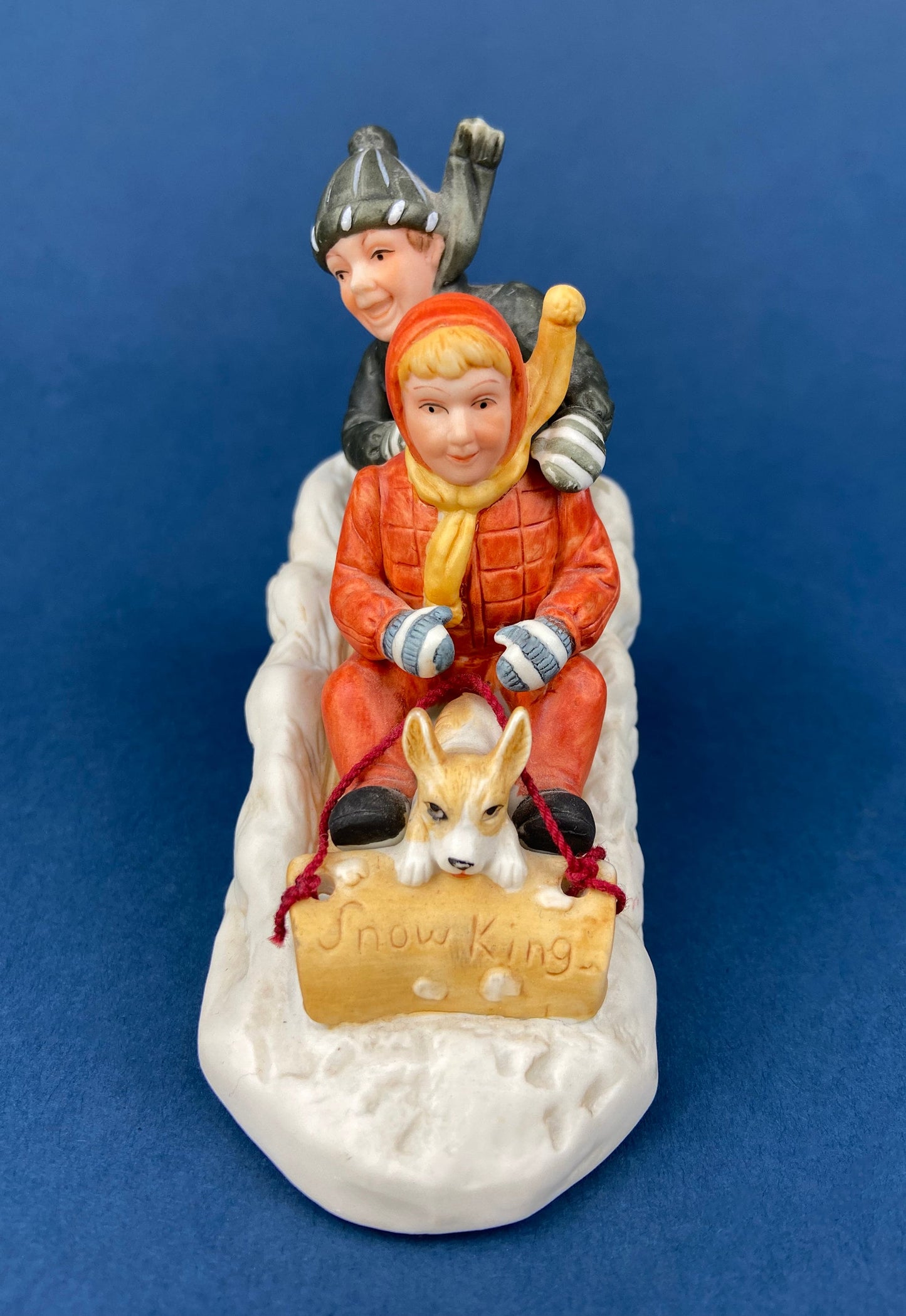 Kids & Dog on Sled Porcelain Figurine. Christmas. Downhill Racer. Inspired by Norman Rockwell. Museum Collections. Snow King. Collectibles.