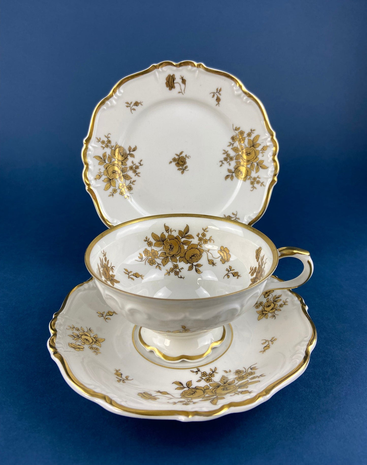 White and Gold Cup and Saucer. Paragon Porcelain, By Appointment to Her Majesty the Queen Potters. Dining Room Cabinet Display.