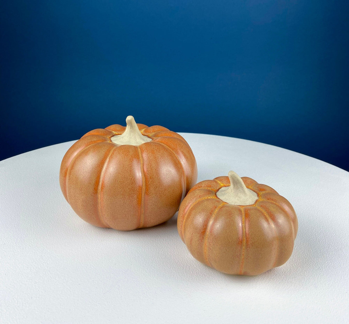 Set of Three Ceramic Pumpkins of Varying Sizes. One Large and Two Smaller. Staple Thanksgiving Fall Decoration. Home Decor. Store Display.