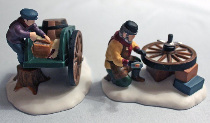 Porcelain Figurines by Department 56. Bradford Wheelwright 5818-1, Wheel Repair Men.