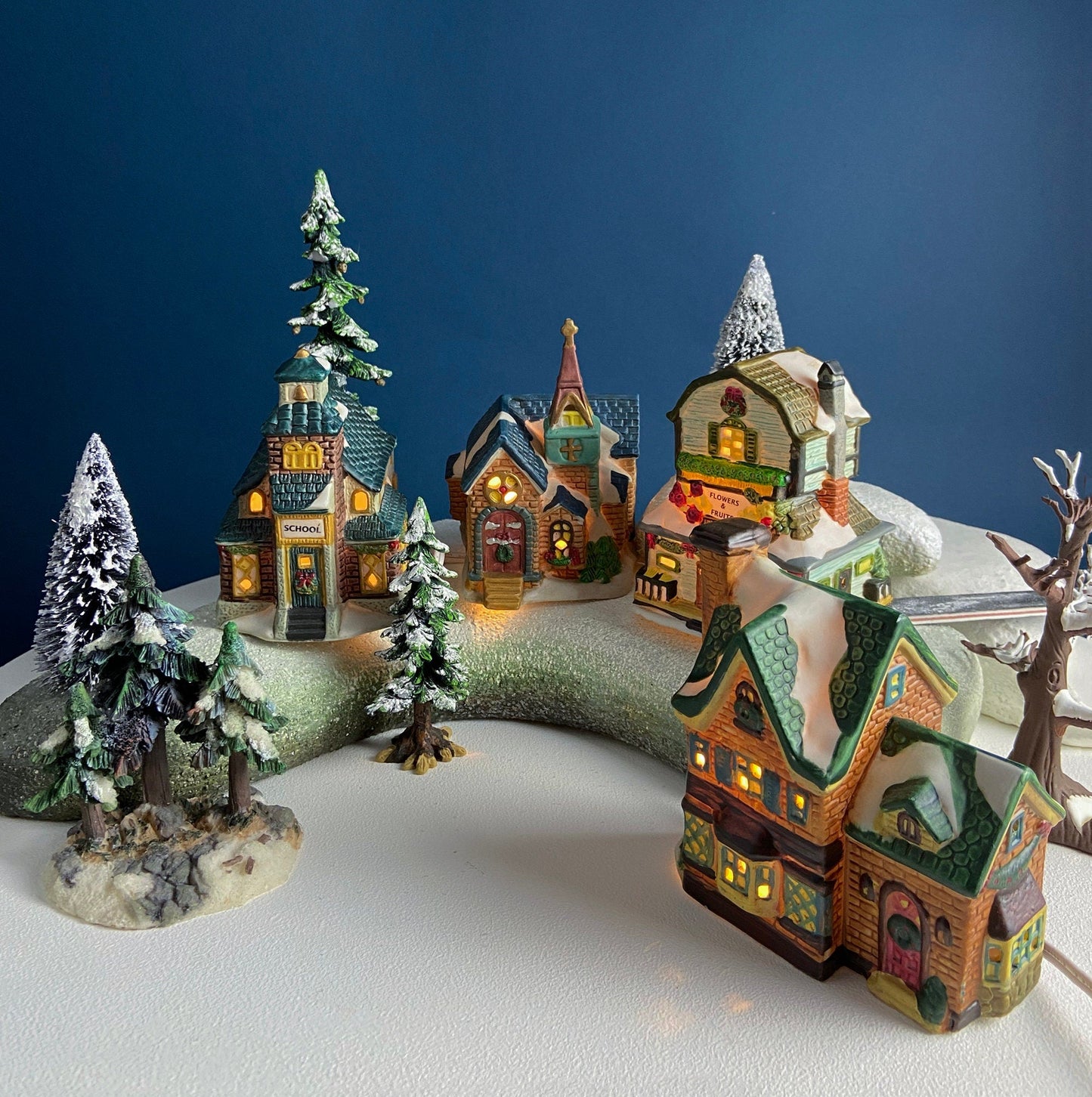 Christmas Village Collection of Small Illuminated Houses. Set of 4 Bldgs: Mill, 2 Churches, Train St., Council Offices, 2 Sheep and 3 Pines.