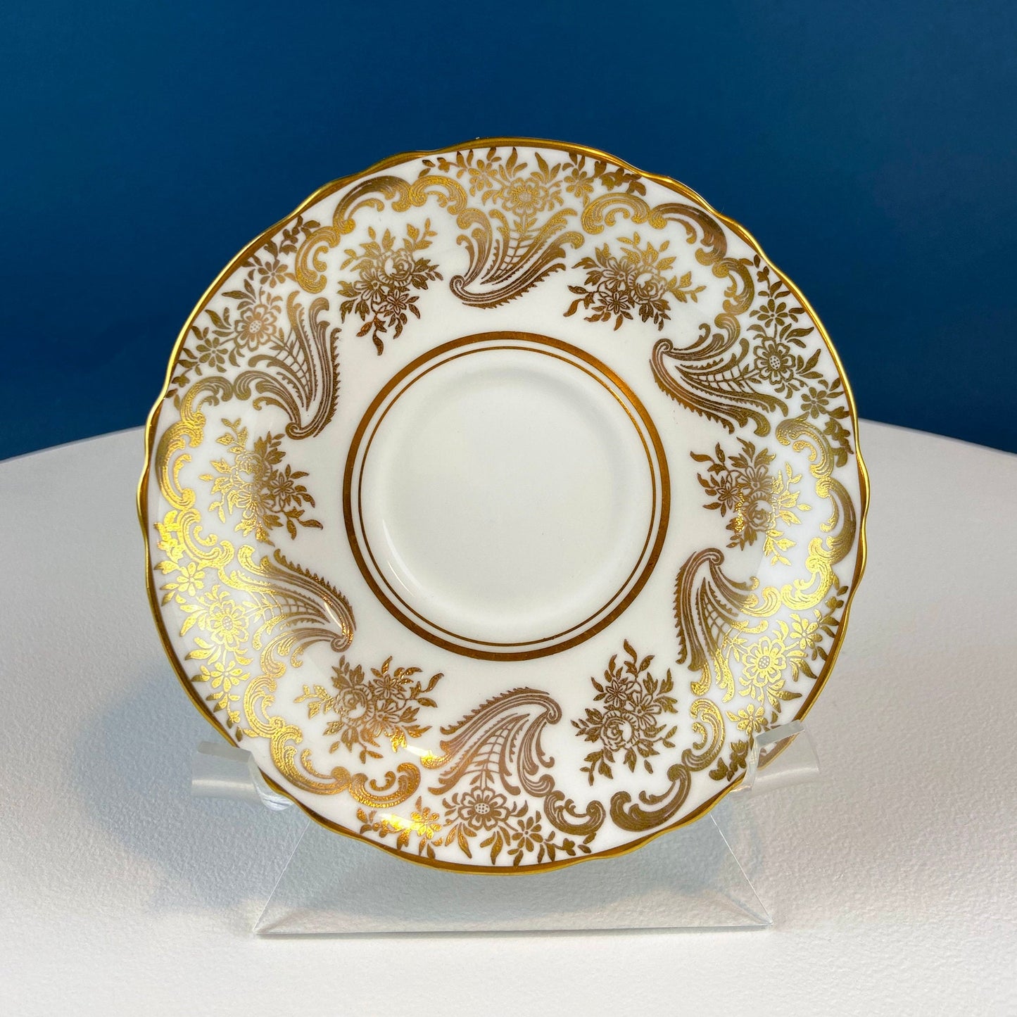 White and Gold Cup and Saucer. Paragon Porcelain, By Appointment to Her Majesty the Queen Potters. Dining Room Cabinet Display.