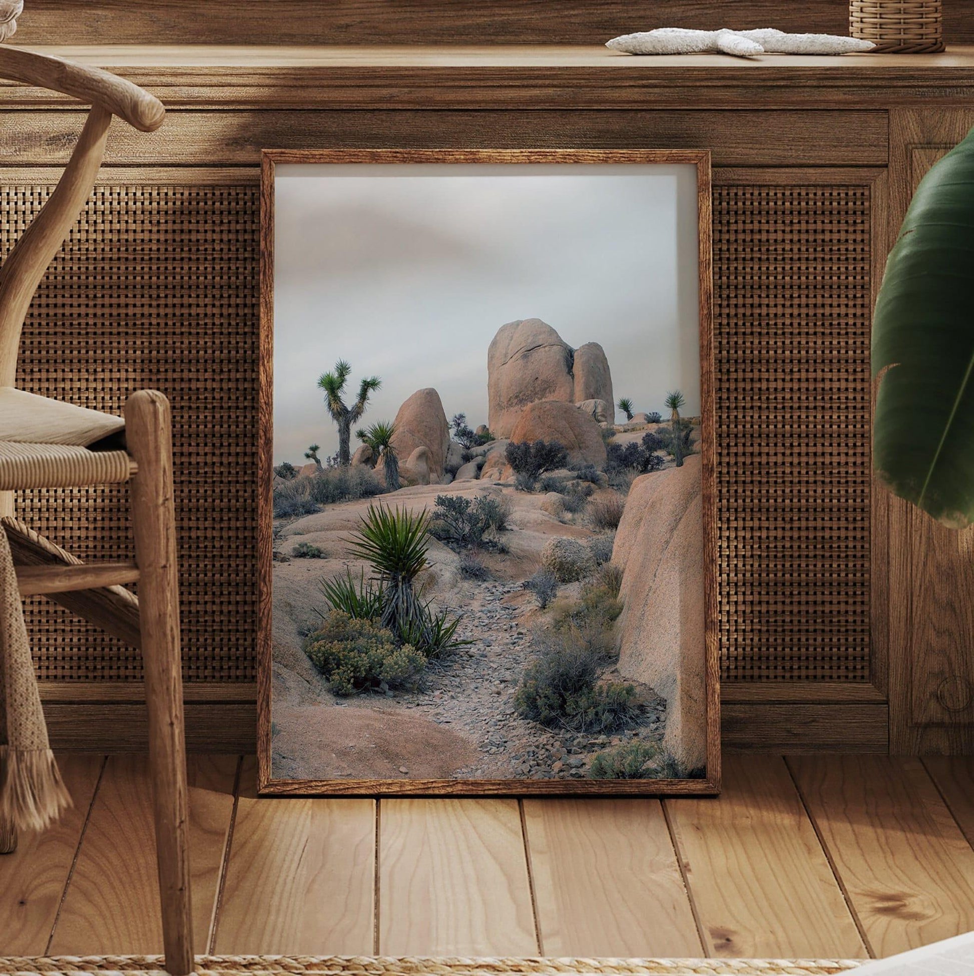 California desert art print featuring unique rock formations and Joshua Trees in serene landscape.