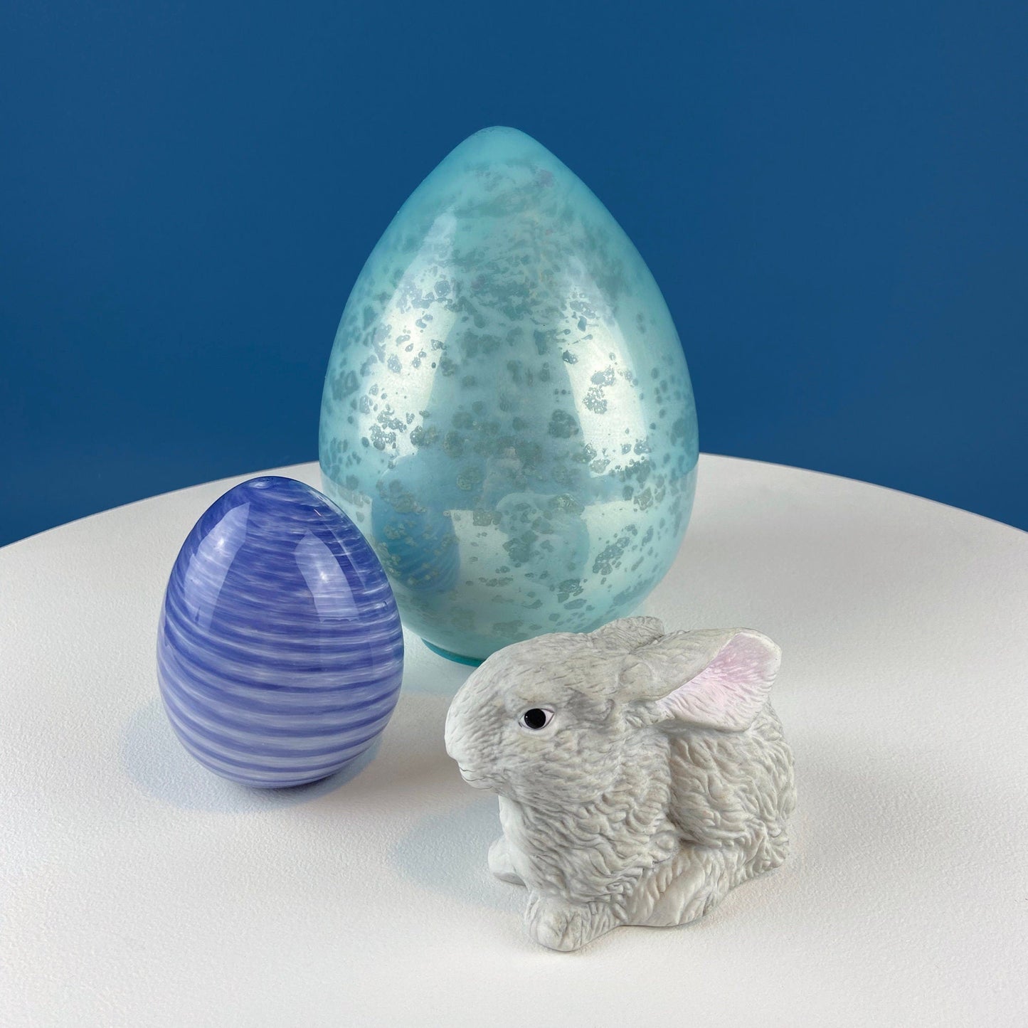 Set of Two Glass Eggs. Large Textured Blue and Smaller Purple with Swirl Embedded in Glass. Easter or Spring Decor. Dining Room Decor.