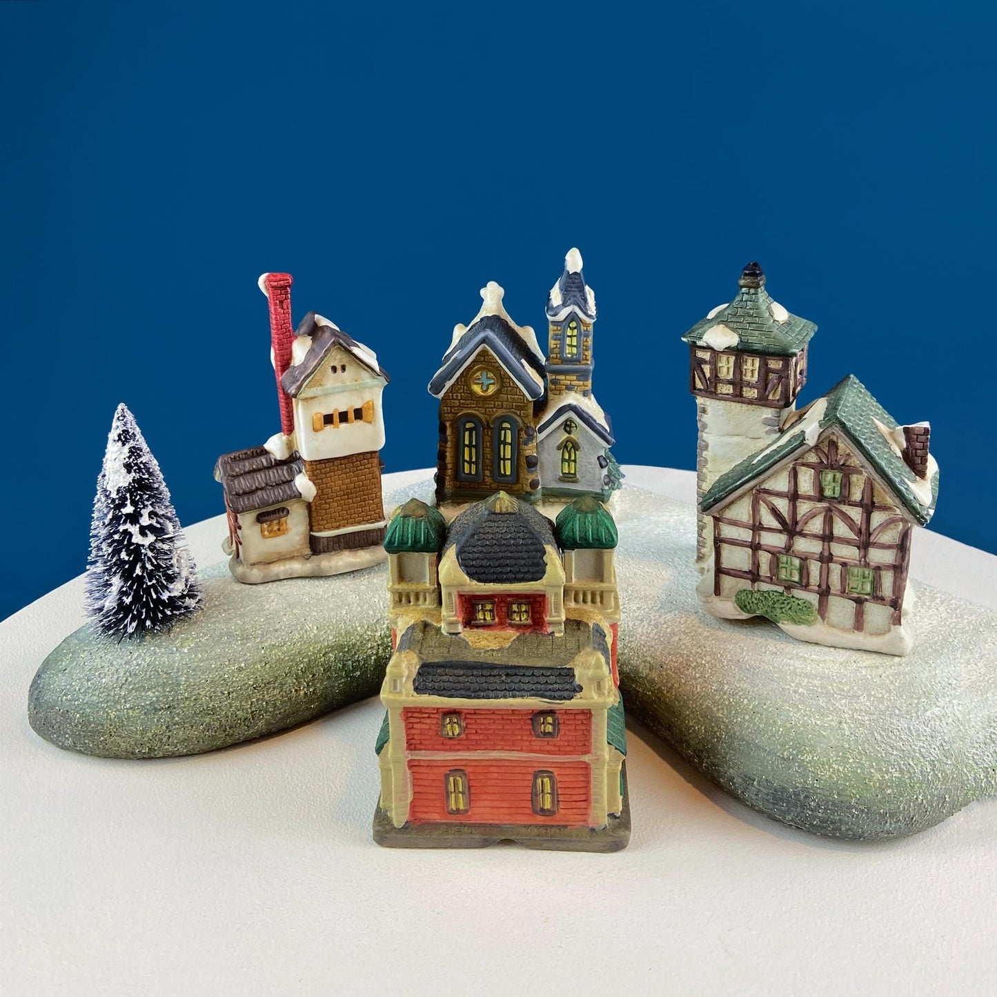 Christmas Village Collection of Small Illuminated Houses. Set of 4 Bldgs: Mill, 2 Churches, Train St., Council Offices, 2 Sheep and 3 Pines.