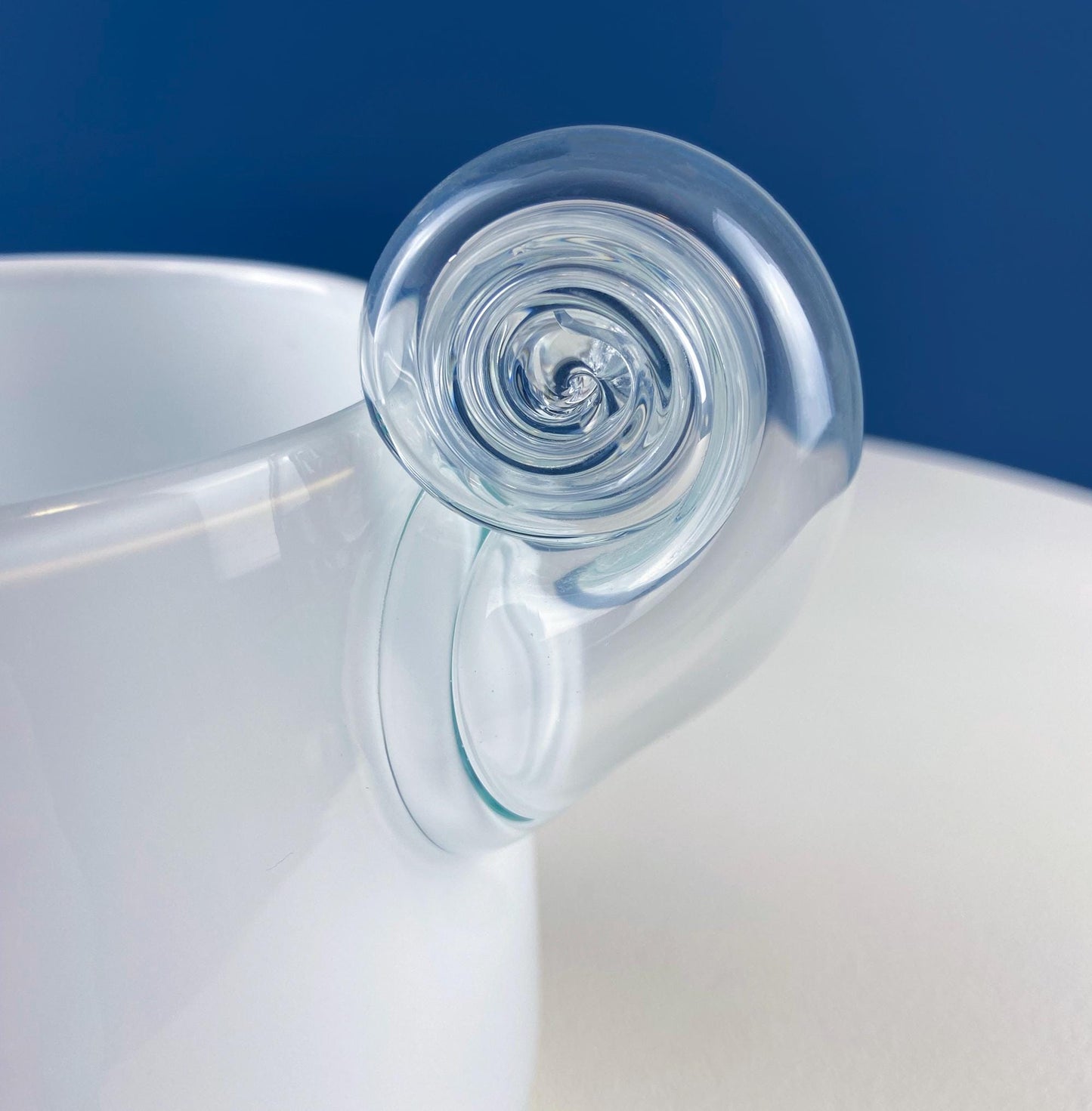 Modern White & Clear Glass Vase with Swirl Handle. Unique White Cased Hand Blown Art Glass with Scroll. Bath Storage. Interior Design Ideas.