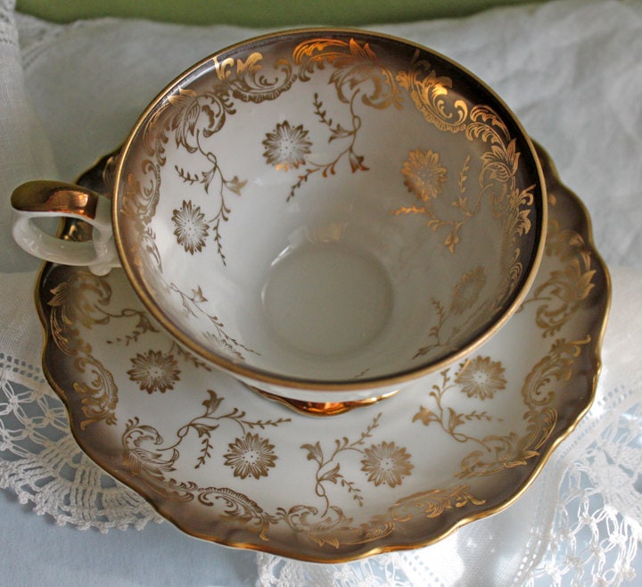 Tea Cup and Saucer by Paragon Made in England in Yellow, Gold, Pink.