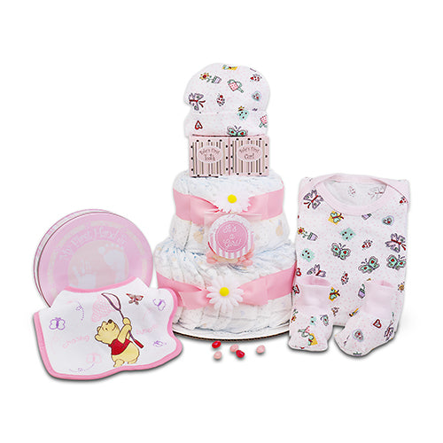 Baby gift set with diaper cake, bib, and booties on a white background