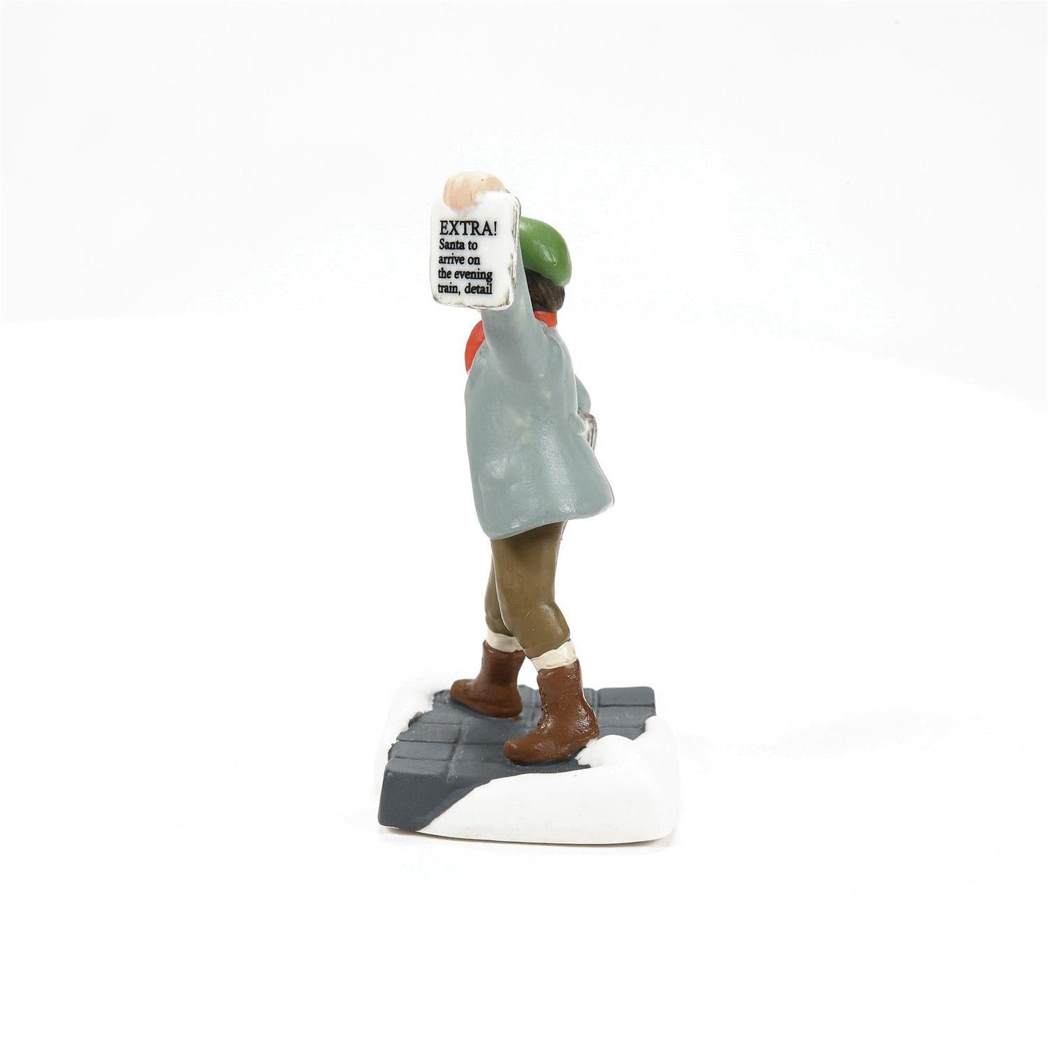 Friends And Neighbors - 3 Piece Set figure holding a sign, standing on a snowy base, approximately 2.4 inches tall.
