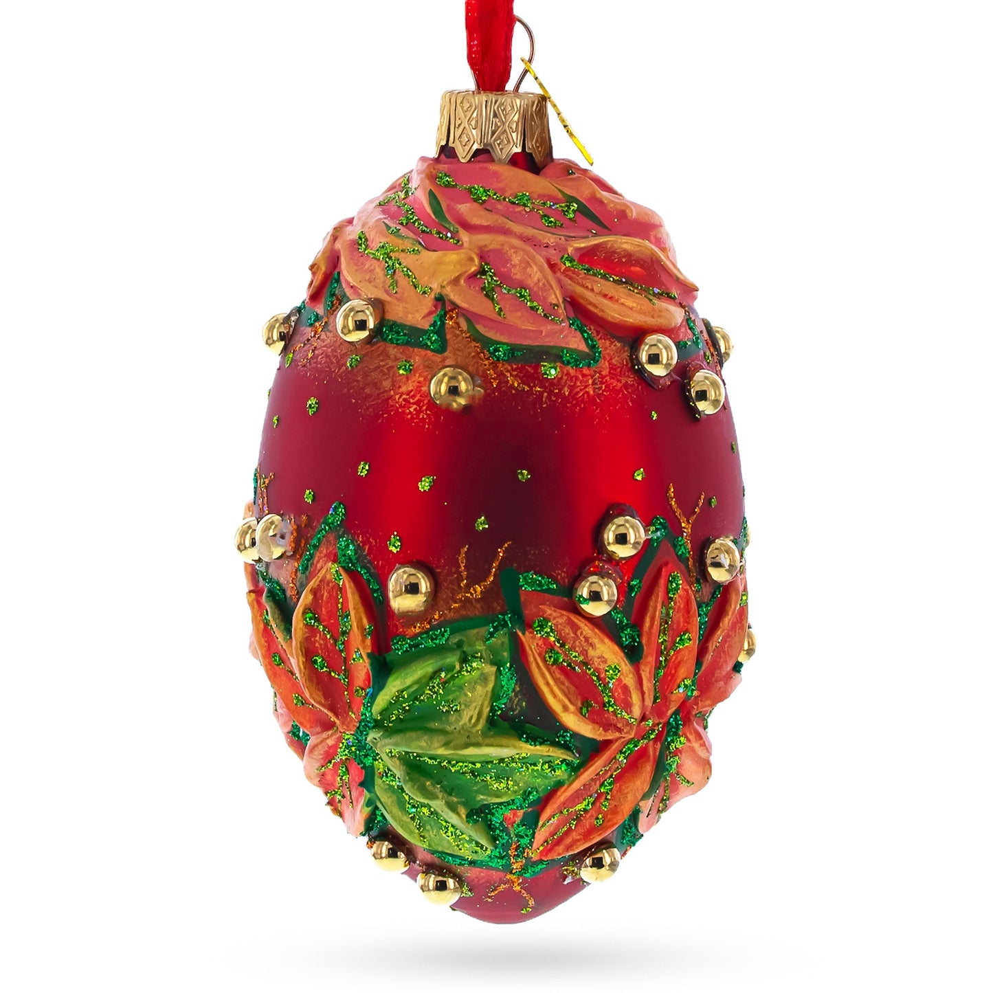 Red and Green Leaves on Red Glass Egg Ornament 4 Inches