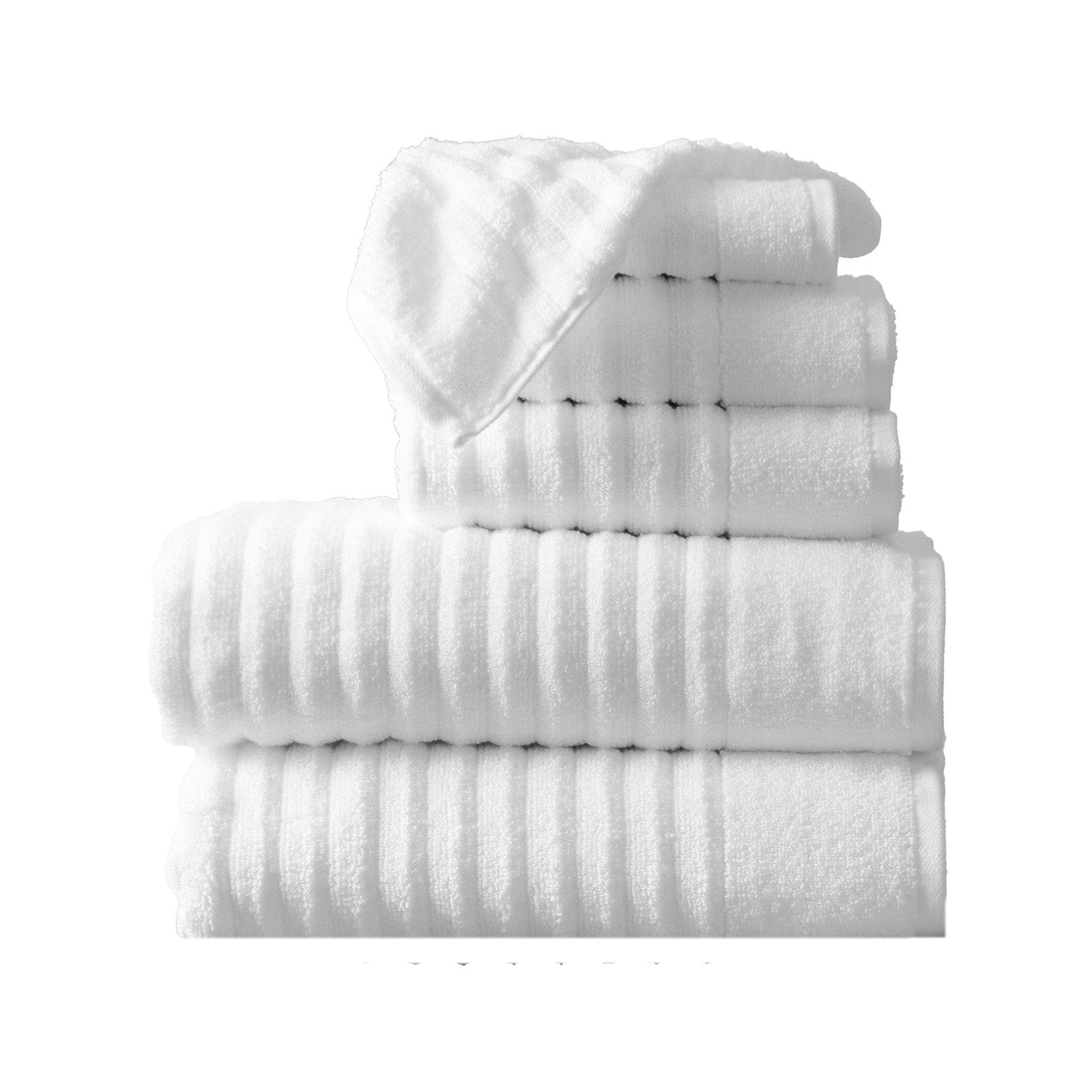 Stack of white towels on a white background