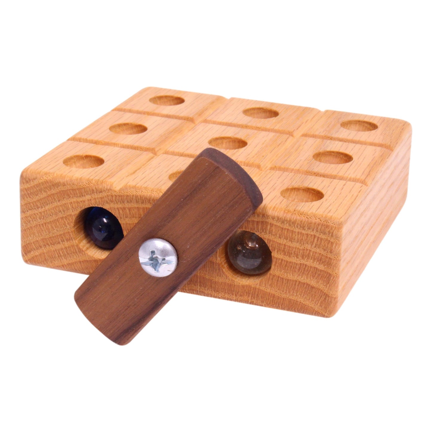 Wooden tic-tac-toe game with marble storage on a white background