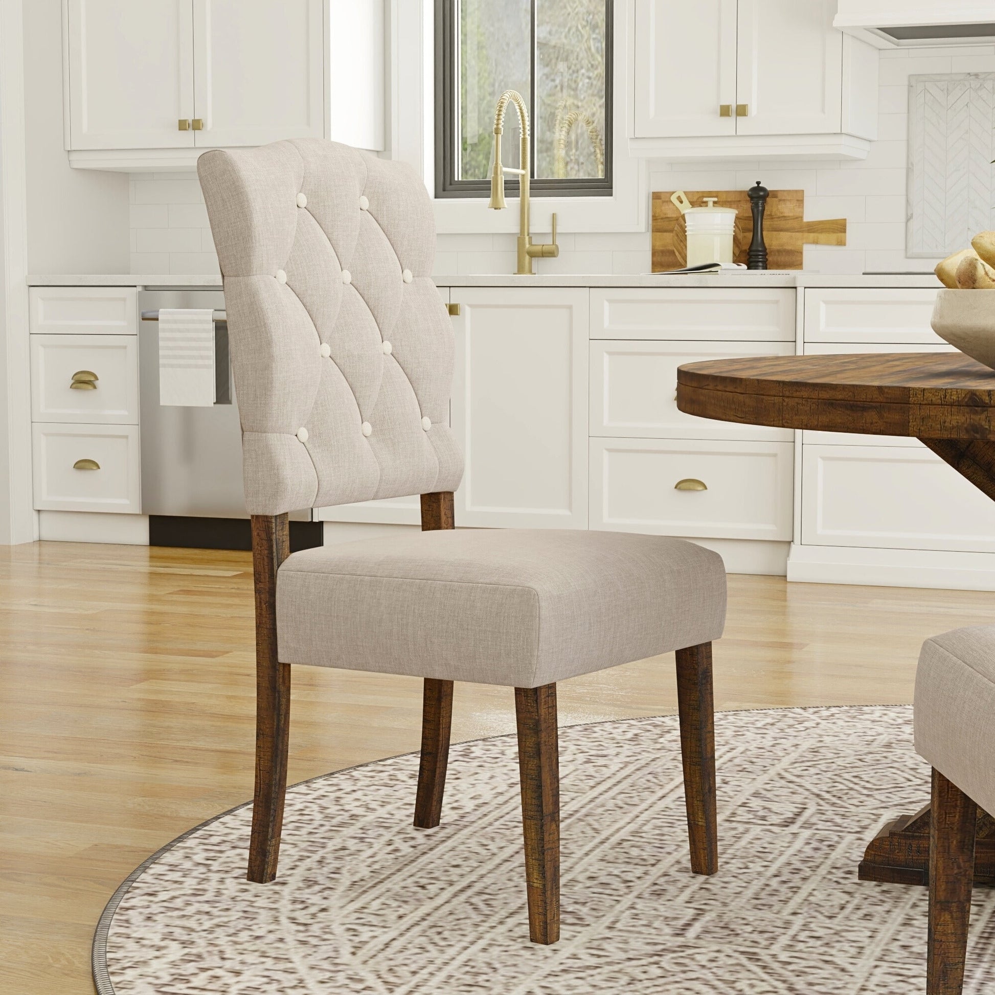 Newberry Side Chairs in medium brown tones with button-tufted backrest in a modern kitchen setting.