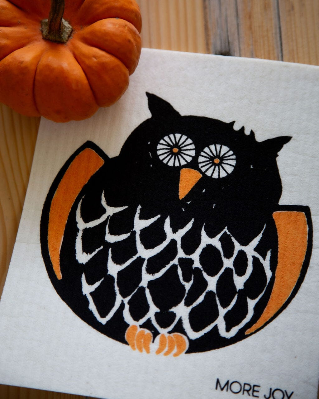 Owl Swedish Dishcloth featuring an orange and black owl design, perfect for Halloween decor and kitchen use.