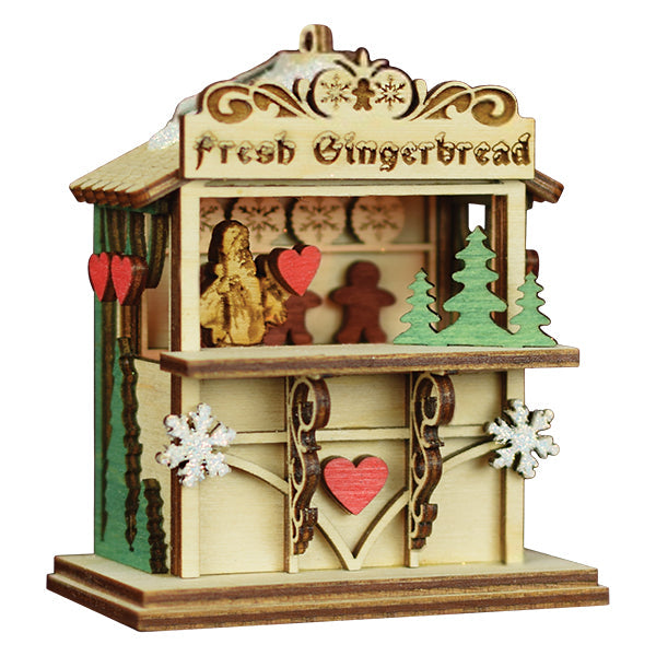 Gingerbread Market Ginger Cottage Collection showcasing a charming gingerbread stall with decorative elements.