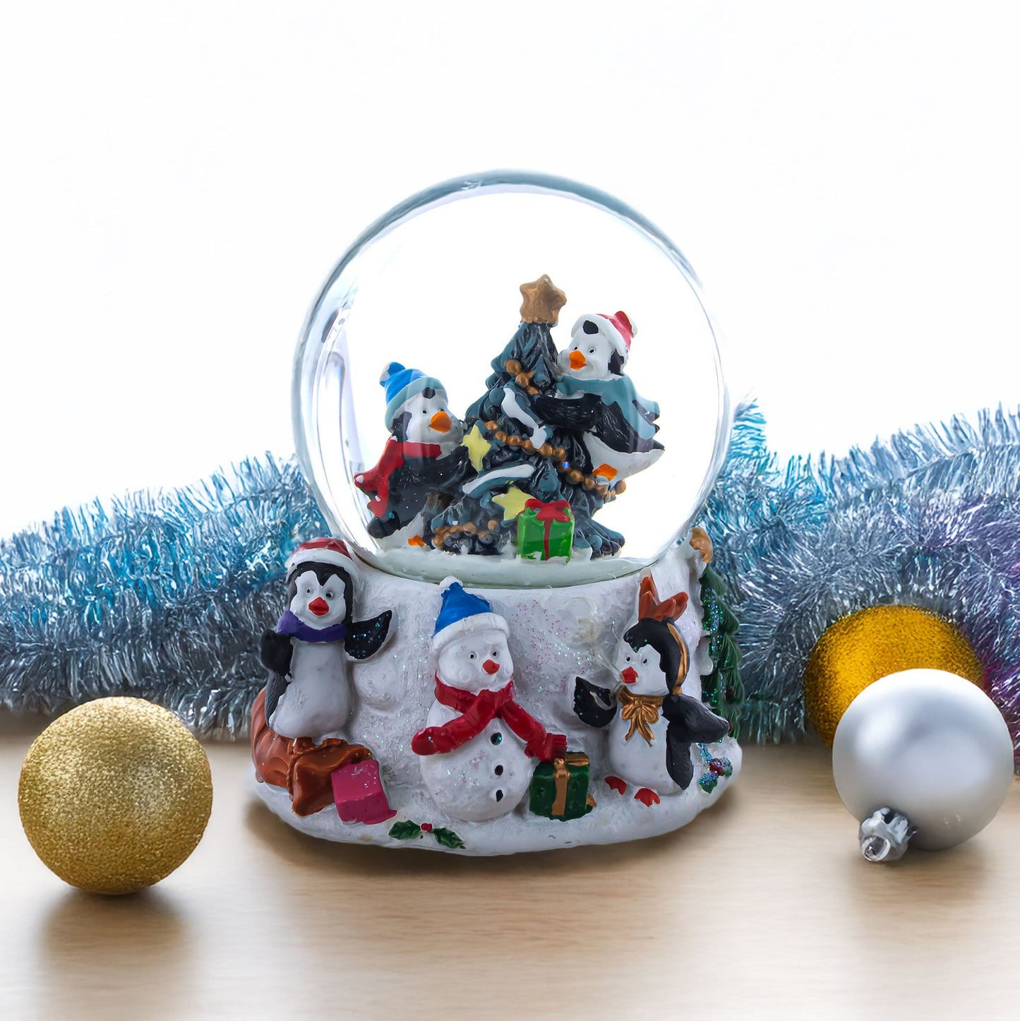 Penguins' Festive Tree Celebration Snow Water Globe