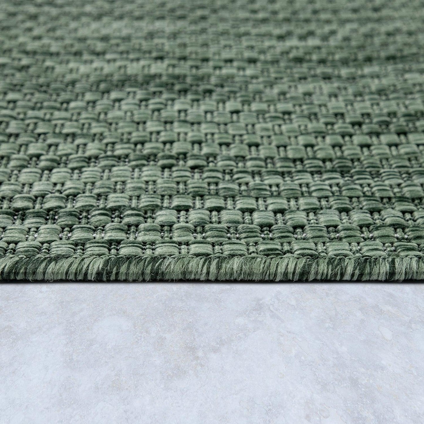Solid Outdoor Rug for Patio or Balcony weatherproof in Mottled Dark Green
