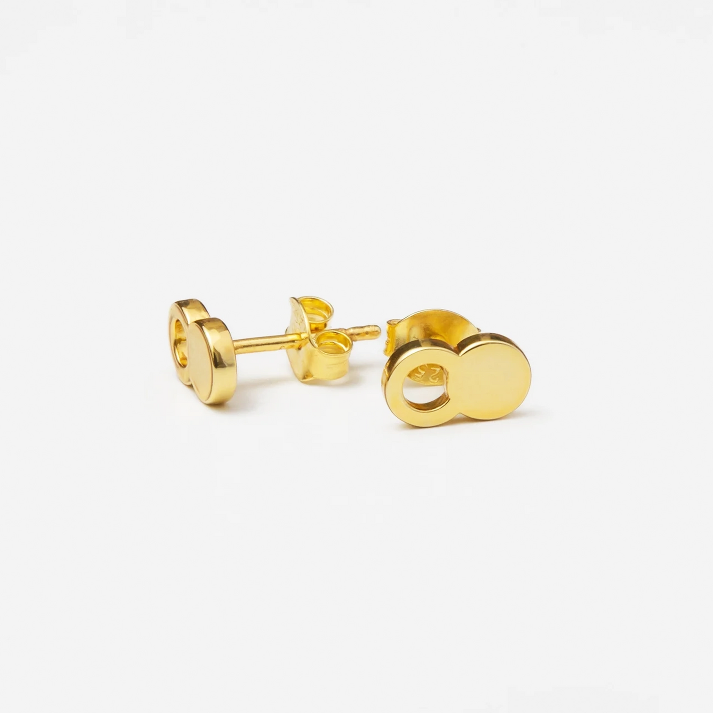 The Empty Tomb Stud Earrings in gold, symbolizing hope and faith, inspired by the resurrection.