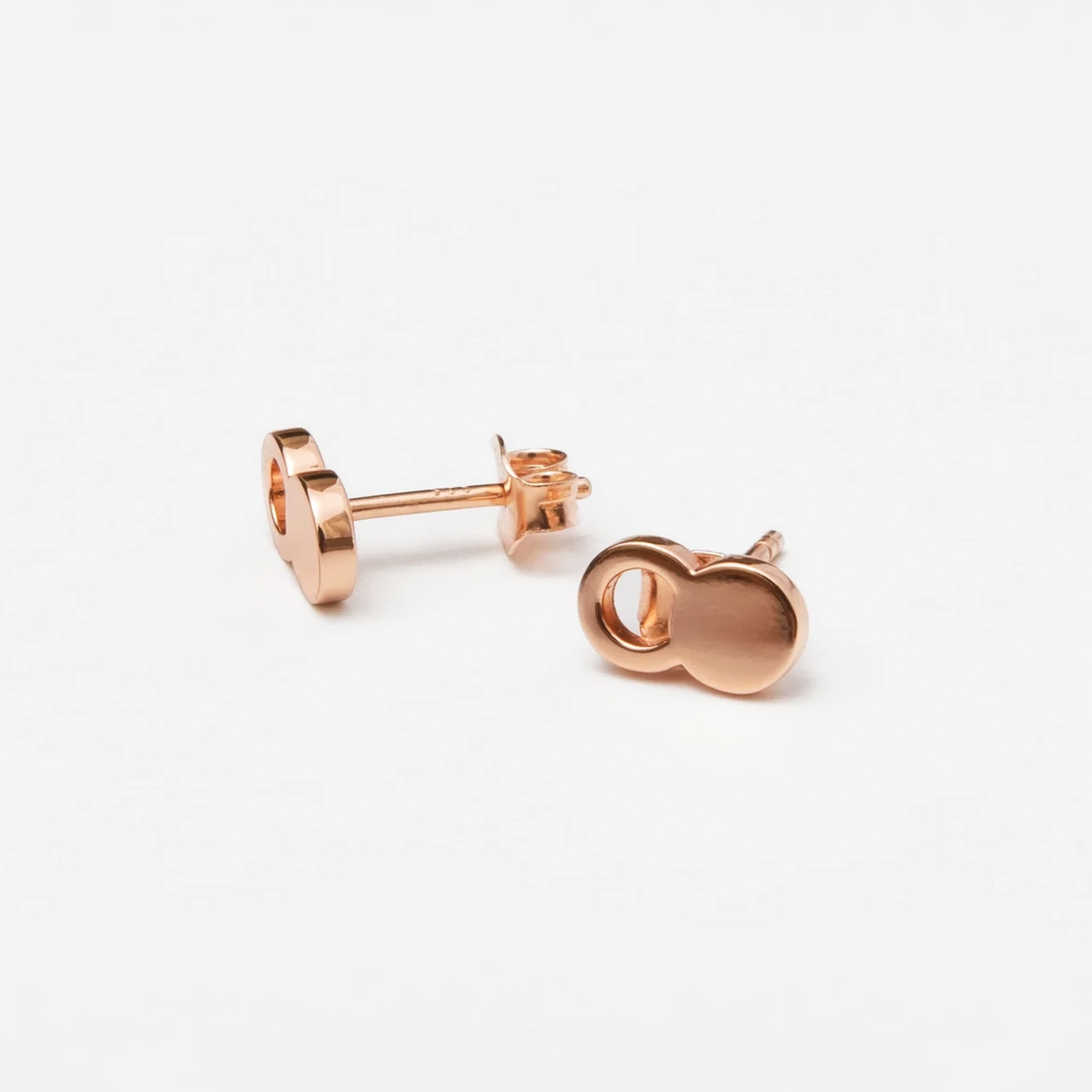 The Empty Tomb Stud Earrings, elegant empty tomb design, symbolizing hope and faith, featured in The Shift film.
