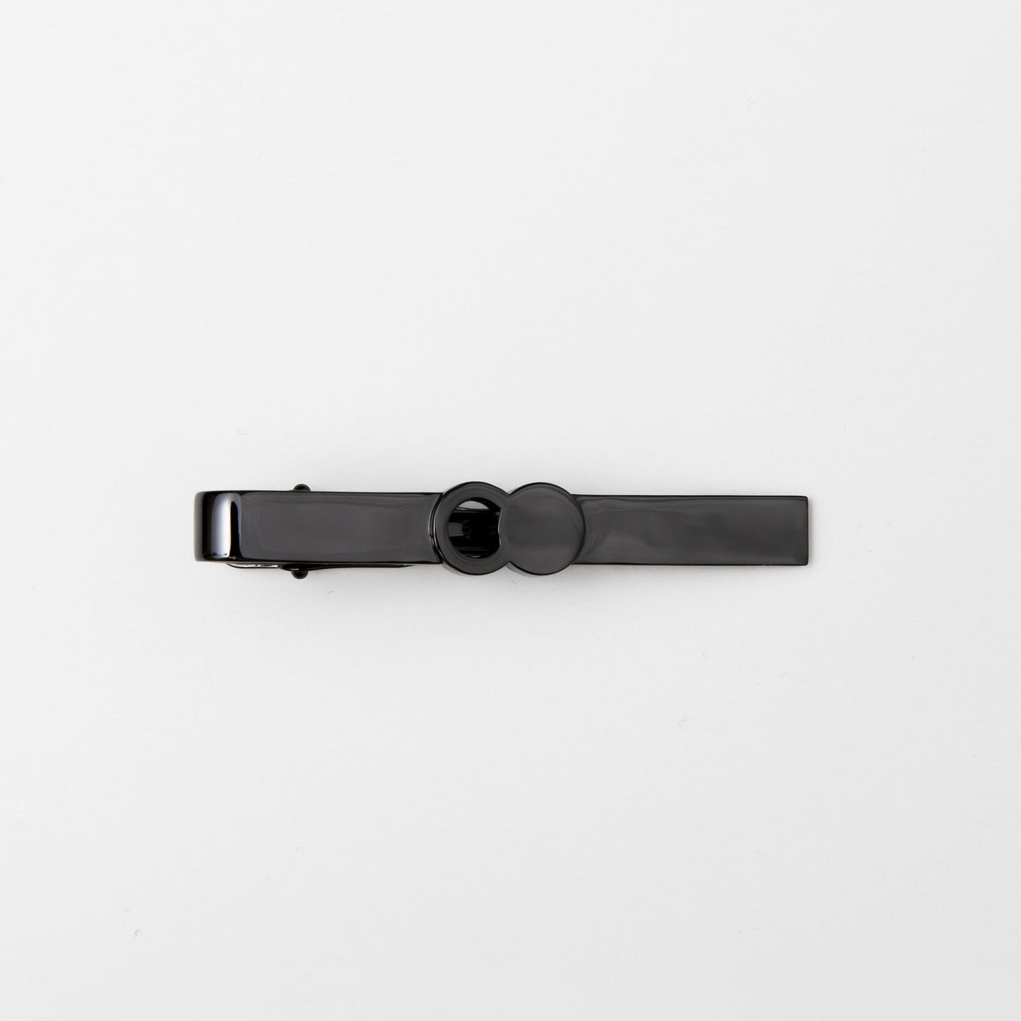 The Empty Tomb Tie Clip in sleek black design, perfect for enhancing formal attire with style.