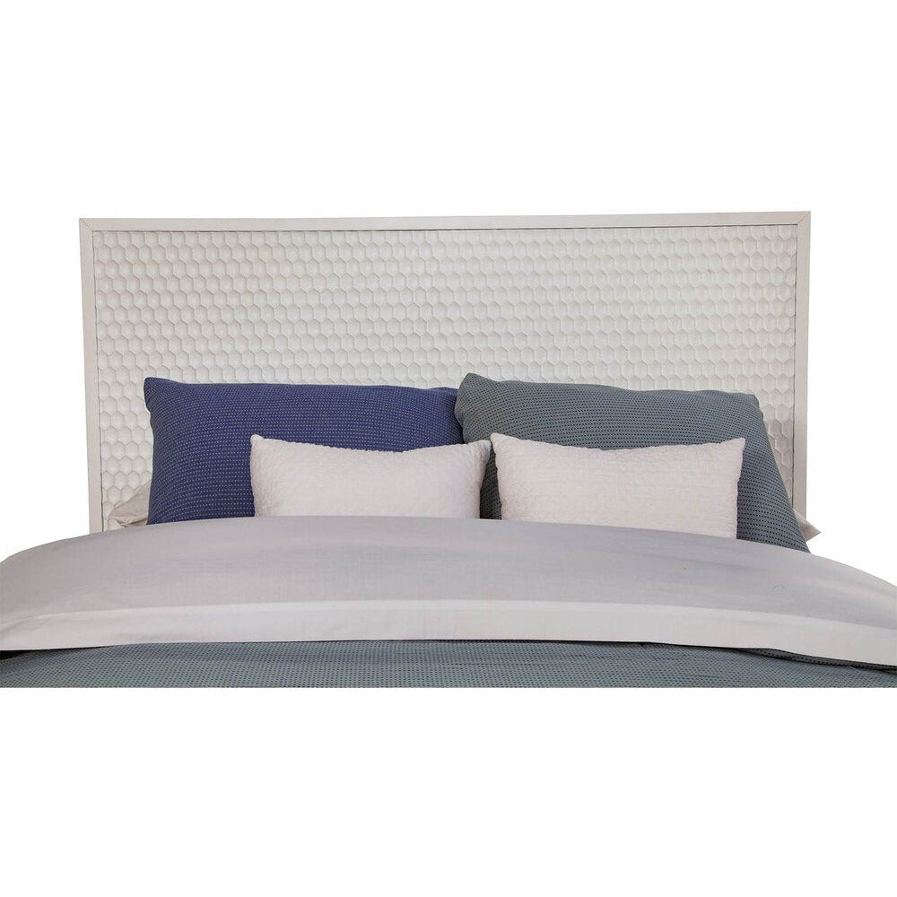 White Pearl Headboard featuring a textured design, bordered by Mahogany wood in a sleek White finish with decorative pillows.
