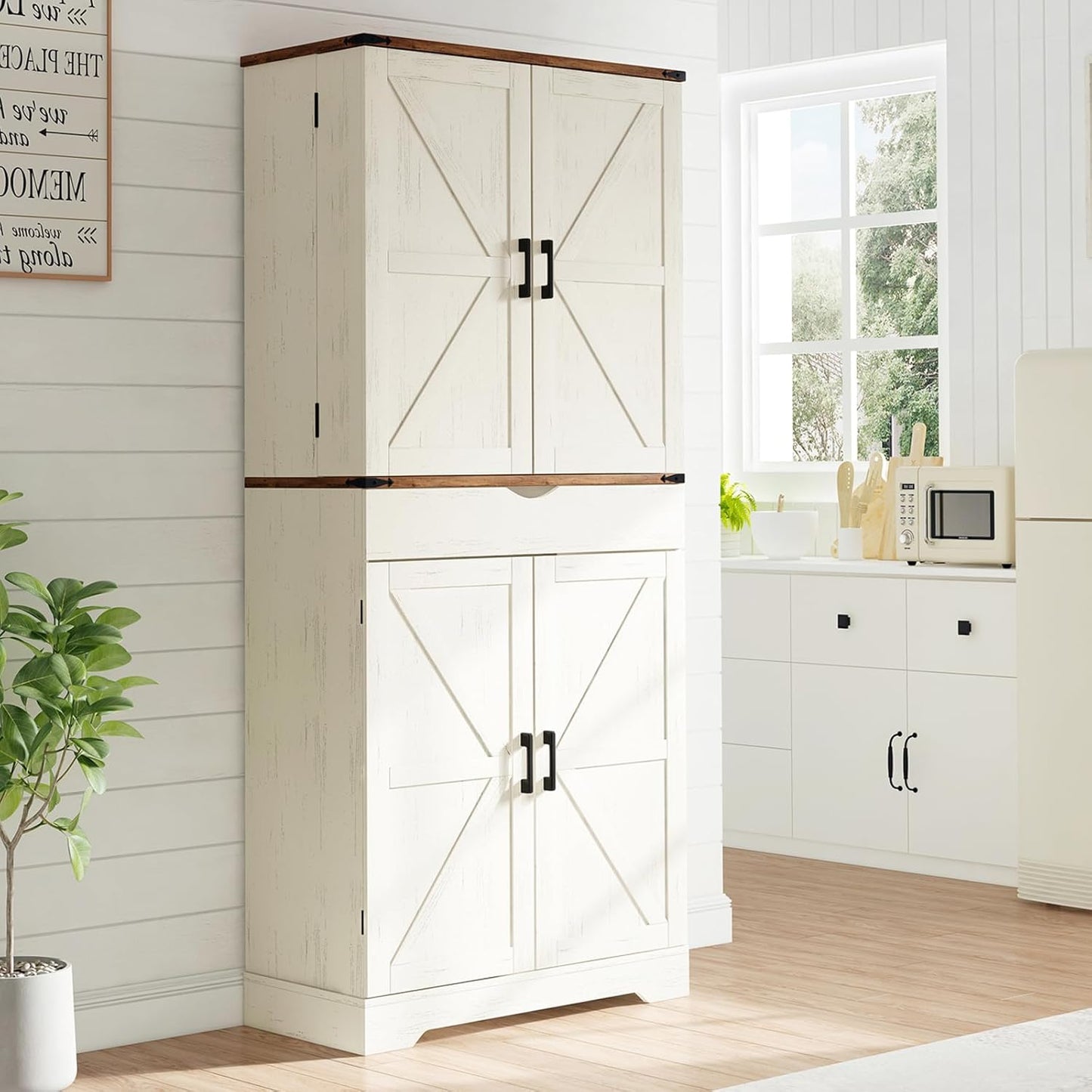 Yanosaku SC001 72'' Tall Kitchen Storage Pantry Cabinet in a bright kitchen setting with potted plant.